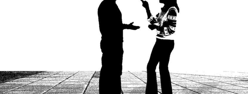 A silhouette of a man and woman arguing